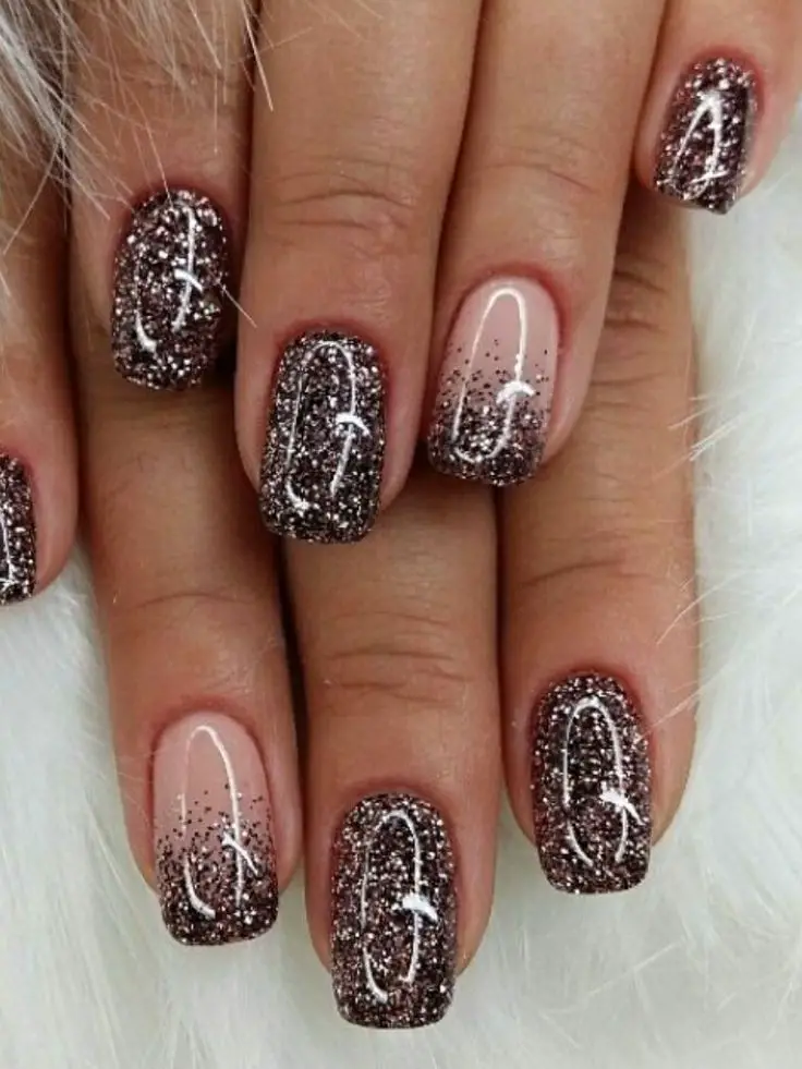 Glitter Gradient nail design Holiday Inspired Nail Ideas for Christmas